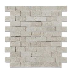 a white brick wall that is made out of blocks