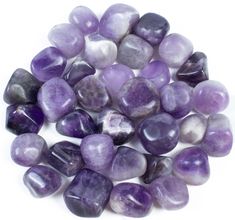 amethystite beads are shown in purple and white colors on a white background