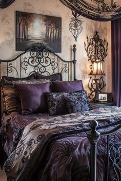 a bed with purple comforter and pillows in a bedroom