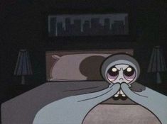 an animated image of a person in bed with their face covered by a blanket and eyes closed