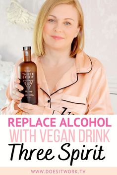 a woman holding a bottle of alcohol with the words replace alcohol with vegan drink three spirit