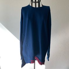 This Is A Unique New York Designed Sweater. It Features A Over Size Fit That Allows Freedom Of Movement And Comfort. 55% Cotton 40% Polyester 5% Spandex Rn# 146156 New With Tag. Blue Sweatshirt For Fall Loungewear, Blue Relaxed Fit Sweater For Loungewear, Blue Long Sleeve Sweatshirt For Loungewear, Blue Relaxed Fit Sweatshirt For Layering, Blue Crew Neck Sweatshirt For Layering, Blue Casual Sweater For Layering, Casual Blue Sweater For Layering, Oversized Blue Top For Layering, Blue Sweatshirt For Spring Layering