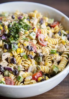 this southwest pasta salad is loaded with chicken, black olives, tomatoes, corn, and cilantro