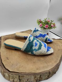 Handmade genuine leather women's slip on. Made with handwoven velvet ikat, natural leather and leather soled. Every size available. İf you like to have other colour please send us messages. Handmade. Very comfy and useful. Made in Turkey. We have door to door express shipping service. İf you have any questions please contact with us. bemyboots.etsy.com Thank You Woven Leather Open Toe Mules, Leather Woven Open Toe Mules, Handmade Casual Slip-on Sandals, Handmade Casual Mules, Bohemian Woven Leather Slip-on Sandals, Casual Handwoven Slip-on Sandals, Artisan Natural Sandals For Spring, Artisan Natural Color Sandals For Spring, Casual Handwoven Slip-on Mules