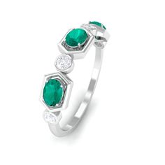 Product Details This elegant Emerald Band Ring is a perfect choice for your sweetheart. Adorned with Oval Cut Emerald and Diamond on Classic Band glams up your look. Product Information SKU SHP-RINGS032225952 Weight 1.76 gm (Approximate) EMERALD INFORMATION No.of Stones 3 Pieces Total Weight 0.43 Carat (Approximate) Dimension(approx) Oval-3X4 mm-3 Pcs Color Green Cut Brilliant Shape Oval Setting Type Other-Setting Quality Grade AAA DIAMOND INFORMATION No.of Stones 4 Pieces Total Weight 0.19 Cara Formal Green Diamond Ring With Half Eternity, Green Emerald Cut Rings With Half Eternity, Green Emerald Ring With Round Diamond Band, Green Emerald Ring Half Eternity Round Cut, Green Emerald Half Eternity Ring Round Cut, Formal Green Emerald Ring With Halo Design, Formal Green Emerald Ring With Half Eternity, Formal Green Half Eternity Jewelry, Green Emerald Half Eternity Ring Fine Jewelry