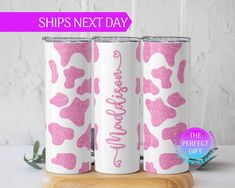 three personalized tumbles with pink leopard print on them and the words, ship's next day