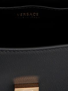 Leather handbag embellished with contrast gold and metal 'Medusa' leather handbag, top handle, leather and removable chain shoulder strap.VERSACE'Medusa' handbagW 20 x H 17 x D 10 cm Luxury Tote Shoulder Bag With Logo Hardware, Formal Tote Shoulder Bag With Logo Hardware, Luxury Tote Clutch With Detachable Handle, Designer Evening Bag With Metal Logo, Designer Evening Bags With Metal Logo, Luxury Rectangular Shoulder Bag With Metal Logo, Luxury Travel Shoulder Bag With Logo Hardware, Designer Shoulder Bag With Top Handle And Metal Logo, Designer Top Handle Shoulder Bag With Metal Logo