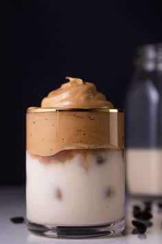 a glass jar filled with some kind of dessert