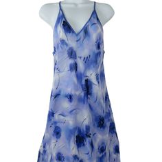 "Vintage 80s LA Intimates Long Slip Nightgown Semi Sheer Blue Floral Tag Size: S Made in USA Slip with colorful floral design Razor Back Straps not adjustable Approximate measurements: Chest 19\" Underarms Length 33.5\" Down Center Back Excellent, no defects noted item#0800/021520" Fitted Blue V-neck Nightgown, Blue V-neck Nightgown For The Beach, Blue Spring Sleep Dress, Blue Spring Vacation Nightgown, Blue Sleeveless Vacation Nightgown, Sleeveless Blue Nightgown For Vacation, Blue Summer Nightgown For Vacation, Blue Summer Vacation Nightgown, Summer Vacation Blue Nightgown