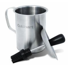 a stainless steel cup with a spoon and fork