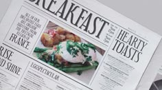 a newspaper with some food on top of it