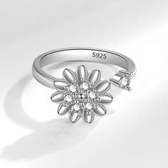 Color: White gold color Size: Adjustable Opening Fashion Element: Flowers Style: Europe and America Flower-shaped Promise Ring For Spring, Spring Flower-shaped Promise Ring, Spring Flower Shaped Promise Ring, Flower Shaped Anniversary Rings For Spring, Silver Flower-shaped Rings For Spring, Silver Flower Shaped Rings For Spring, Silver Open Flower Ring For Spring, Beautiful Meaning, Spinning Rings