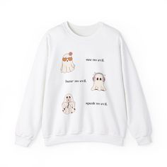 A cute ghost sweatshirt featuring a 'see no evil, hear no evil, speak no evil' design, perfect for Halloween. This cozy sweatshirt is made with a medium-heavy fabric blend of 50% cotton and 50% polyester, providing warmth for the colder months. The classic fit and crew neckline offer a comfortable wearing experience, while the double-needle stitching ensures durability. Ideal for those who enjoy spooky and fun designs, this sweatshirt is a great addition to any Halloween wardrobe. Product features - Made with a cozy medium-heavy fabric blend of 50% cotton and 50% polyester - Classic fit and crew neckline for comfortable wear - Cute ghost design perfect for Halloween - Durable double-needle stitching at key seams - Ethically made using US grown cotton and sustainable production practices Ca Funny White Long Sleeve Tops, White Graphic Print Sweatshirt For Halloween, Funny White Sweatshirt For Streetwear, White Sweatshirt With Funny Print, Spooky White Cotton Sweatshirt, Spooky White Tops For Streetwear, White Spooky Cotton Sweatshirt, White Spooky Tops For Streetwear, White Cotton Spooky Sweatshirt