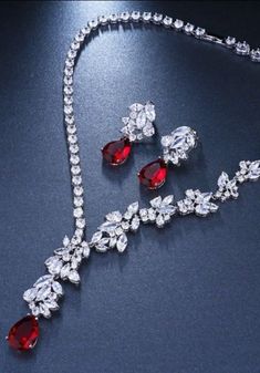 Women's Gold Zircon Crystals Earrings & Necklace Set - A.A.Y FASHION Luxury Red Jewelry Channel Set, Luxury Red Jewelry Sets With Elegant Design, Luxury Red Jewelry Sets For Women, Luxury Red Crystal Jewelry Sets, Red Jewellery Set, Asymmetrical Jewelry, Red Jewellery, Crystal Jewelry Sets, Copper Style