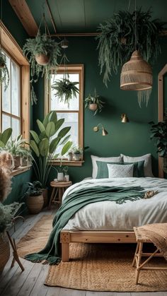 a bedroom with green walls and plants hanging from the ceiling, along with a bed