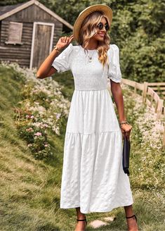 This maxi dress has a smocked bodice and tiered skirt for a breezy, romantic look. Perfect for a day at the beach or a night out, this dress will make you feel like you're living in a seaside fantasy. (No boring ol' landlubber attire here, matey!) Size Guide: Model is 5’8” tall, and has a 33.8” bust, 24.2” waist, & 35.7” hips. She is wearing a S / US 4 / AU 8. This dress is true to size. Material: Self: 100% Nylon, Lining: 100% Polyester Feature: V-Neckline. Short Sleeves. Crochet waist. Lace fabrication. Lined. Maxi length. Flowy fit. Care Instructions: Machine wash / Cold hand wash White Casual Maxi Length Tiered Dress, White Casual Maxi Tiered Dress, Bohemian Ruched Maxi Dress For Day Out, Fitted Tiered Skirt Maxi Dress For Vacation, Tiered Maxi Dress With Smocked Back For Brunch, Tiered Midi Dress With Smocked Back For Vacation, Billowy Maxi Dress For Day Out, Casual Maxi Dress With Smocked Bodice For Garden Party, Tiered Dress With Smocked Bodice For Vacation