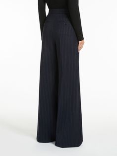 Find MAX MARA Wool Palazzo Trousers on Editorialist. Palazzo trousers in luxurious wool fabric, with a distinctive wide-leg silhouette, trouser crease and double pleats on the front. Embellished with slanted side pockets and double welt pockets with button on the back. Fastening with a wide waistband tab, zip fly and small hook. Palazzo Trousers, Wide Waistband, Wool Fabric, Max Mara, Welt Pockets, Welt Pocket, Wide Leg, Trousers, Wool