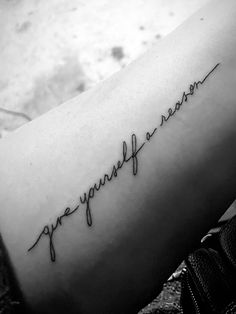 a woman's arm with the words, you are beautiful written in cursive handwriting