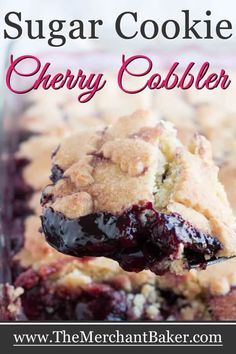 a close up of a spoonful of sugar cookie cherry cobbler with text overlay