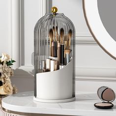 PRICES MAY VARY. Sliding Door: Makeup brush holder with lid is enclosed, so no more dust particles and bacteria landing on makeup brushes, sliding to close rather than lifting a cover from up above 360 Degrees Rotating Base: Make up brush holder organizer spins, so you can access all the items easily, the cover can stay on when brushes are removed or added 3 Different Sections: With different depths slots, makeup brush storage allows short or tall makeup brushes and small cosmetic tools to be st Make Up Storage, Lipstick Brush, Makeup Station, Makeup Storage Box, Makeup Brush Organization, Makeup Brush Storage, Cosmetic Display, Makeup Brush Holder, Luxury Cosmetics