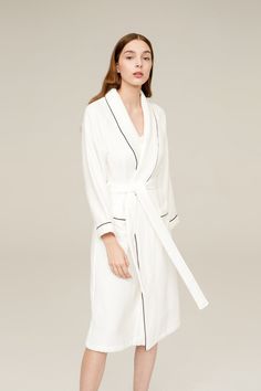 Description Crafted from terrycloth and edged with a fine border piping, the Provence Bathrobe provides comfort and style for those days lounging around your home. Made from 100% long-staple cotton. 100% long-staple cotton Features a full shawl collar, and two patch pockets Special designed texture outside for rich and soft appearance Looped towelling yarns inside for maximum water absorption Designed for unisex Machine wash friendly Size S M L Total Length 42 43 50 Sleeve Length 25 26 28 Height White Polo, Those Days, Water Absorption, Texture Design, Black Trim, Terry Cloth, Shawl Collar, Home Made, Provence