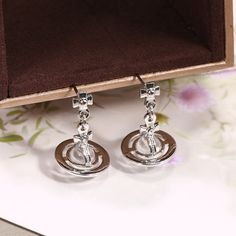 Tidy Rock Saturn Simple Transparent Crystal Pendant Earrings for Women's Jewel To Send His Girlfriendry PartyModel Number:1005002980494026 Round Alloy Earrings For Parties, Party Earrings With Clear Metal, Girlfriend Anniversary, Engagement Party Wedding, Pendant Earrings, Crystal Pendant, Quality Jewelry, Crystal Earrings, Accessories Earrings