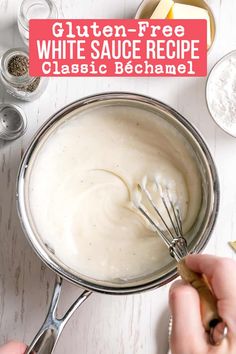 a person whisk cream into a sauce in a pan