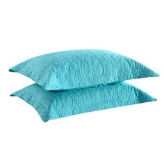 two blue pillows sitting on top of each other