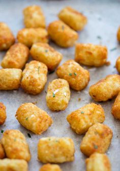 some fried food is on a baking sheet