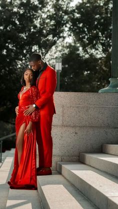 Prom Couple Poses Black People, Prom Photoshoot Black Couple, Prom Pics Black People, Red Prom Dress Black Couple, Red Prom Couple Outfit, Prom Couples Black People, Prom Picture Ideas For Couples, Red Prom Couple, Prom Outfits For Couples