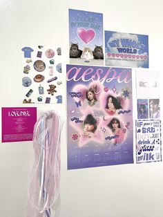 a white refrigerator freezer covered in magnets and pictures