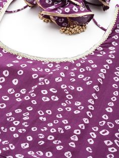 Grab this beautiful 2-piece set. The set comes with bandhani print anarkali kurta has round neck with dori & tassels, long sleeves & calf length teamed with silk chiffon dupatta with lace detailing. Color - Violet Kurta Fabric-Cotton Dupatta Fabric - Silk Chiffon Neck-Round Neck with Dori & Tassels Sleeves-3/4th Sleeves Work - Bandhani Print Detailing Washing Instructions-Hand Wash DISCLAIMER - The color of the product may be differ due to screen settings of device. A misprint here and a color d Bandhani Print Anarkali, Dori Tassels, Kurta With Dupatta, Bandhani Print, Formal Jewelry, Anarkali Kurta, Cotton Dupatta, Color Violet, Chiffon Dupatta