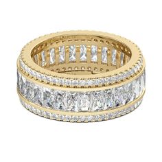 a gold ring with princess cut diamonds on the inside and outside, set in 18k yellow gold