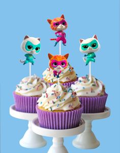 cupcakes with littlest pet shop characters on top