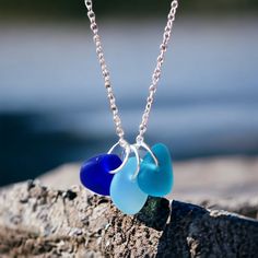 Sea Glass Necklace, Sea Glass Choker Necklace, Layering Necklace, Beach Glass Necklace, Sea Glass Jewellery, Blue Sea Glass Necklace, Beach Unique necklace featuring 3 bright and beautiful hues of ocean blues & aqua frosted glass stones.  Each necklace is custom made - all three pieces have each been selected to ensure they are of similar size; therefore please allow a little variation from the picture shown. Each necklace is unique! I have plenty more sea glass jewellery pieces in my shop, take a look and you may find something special to match!  Beautiful Silver plated link chain available in a variation of sizes - please select your choice when ordering. (If you require a larger quantity than is showing available, please send me a message and I'll see if I can meet your requirements.) I Adjustable Blue Jewelry With Recycled Glass, Adjustable Blue Jewelry Made Of Recycled Glass, Adjustable Blue Recycled Glass Jewelry, Adjustable Blue Ocean-inspired Necklace, Blue Sea Glass Necklaces For Jewelry Making, Adjustable Blue Charm Necklace With Lobster Clasp, Ocean-inspired Blue Sea Glass Necklaces, Handmade Blue Recycled Glass Necklace, Handmade Blue Jewelry With Sea Glass