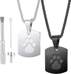 a dog's paw print is shown on the front and back of this necklace