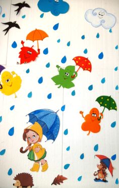 there are many different cartoon characters hanging on the wall with umbrellas in the rain