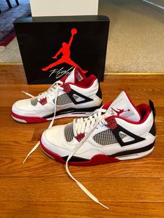 This pair of shoes is a classic Air Jordan 4 Retro Fire Red 2012 model. It is a low top sneaker with a white color and features the iconic Jordan brand. The shoes are in great shape and are perfect for athletic activities. The size is 12 and it is designed for men. The shoes were released in 2012 and the style code is 308497-110. This is a must-have for any Air Jordan fan or collector. **VERY small defect (peeling) on right, inner/bottom portion of shoe** Jordan 4 Retro Fire Red, Jordan 4 Retro, Air Jordan 4, Air Jordan 4 Retro, Red Fire, Low Top, White Color, Air Jordan, Top Sneakers