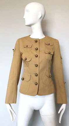 Vintage Moschino Cheap and Chic 1990s Size 6 Khaki Cotton Military Inspired Jacket For Sale at 1stDibs Military Style Khaki Utility Jacket With Buttoned Pockets, Khaki Military Blazer With Flap Pockets, Military Style Khaki Blazer With Flap Pockets, Khaki Utility Blazer With Buttons, Utility Khaki Blazer With Buttons, Fitted Vintage Utility Jacket With Buttons, Khaki Military Utility Jacket With Button Cuffs, Military Style Khaki Utility Jacket With Button Cuffs, Fitted Military Utility Jacket In Khaki