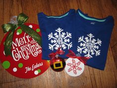 two christmas sweaters, ornament and bauble are on the floor