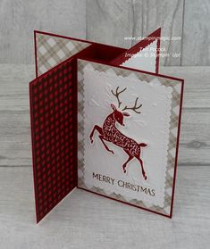 a christmas card with a reindeer on it