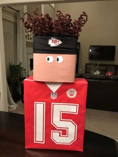 a paper bag that has a football jersey on it