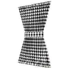 a black and white checkered dress with ruffles