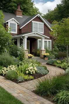 a house with landscaping around the front yard