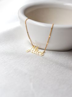 Handmade Name Necklace , 14K Gold Name Necklace , NAME NECKLACE , Dainty Chain , Christmas Gift Discover modern and special versions of name necklaces. This necklace is prepared for you with a special chain. Material: 925 Sterling Silver Chain : Special chain. Chain Length: We have 14,16,18,20,22 inch options. Color Options: Rose, Gold and Silver How to order: Just tell us the color, chain length, name, letter and font you want from the section on the right of the picture. Chain adjustment is ma Elegant Custom Name Chain Necklace As Gift, Elegant Custom Name Chain Necklace For Gift, Elegant Custom Name Chain Necklace Gift, Engraved Nameplate Chain Necklace As Gift, Engraved Nameplate Chain Necklace Gift, Elegant Name Chain Necklace For Gift, Nameplate Chain Necklace As Gift, Custom Nameplate Necklace With Adjustable Chain As Gift, Custom Nameplate Necklace With Adjustable Chain For Gift