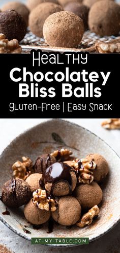 A close-up of several healthy chocolate bliss balls, coated in cocoa powder and resting on a wire rack. One ball is in sharp focus, highlighting its smooth, dense texture for a perfect gluten-free snack.