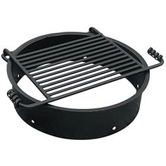 an image of a barbecue grate with grilling tools on the bottom and side