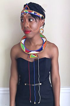 This absolutely amazing necklace is traditionally worn as a wedding necklace by the Maasai community of Kenya.It is made from the finest high quality Masai beads, leather and beaded strands with cowrie shells on each strand. It can be worn on any occasion ( cultural nights, weddings or when you want to connect with mama Africa) and guarantees one is going to stand out from the crowd. Diameter Neck ( inside): 5 - 6 inches / Length: 25 - 29" Proudly handmade in Kenya, Africa Beaded Leather Necklace, Masai Jewelry, Leather Beaded Necklace, Mama Africa, Vibrant Eyes, Cowrie Shells, Head Jewelry, Gift Giver, Maasai