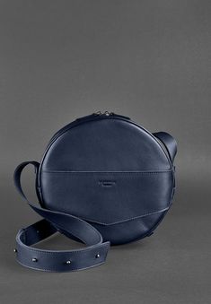 High-end leather round crossbody for ladies Modern Round Case Travel Bag, Blue Shoulder Bag With Round Handle For Evening, Luxury Round Case Shoulder Bag For Everyday Use, Chic Round Case Shoulder Bag For Evening, Modern Bags With Removable Pouch And Round Case, Modern Blue Shoulder Bag For Gift, Modern Blue Shoulder Bag As Gift, Modern Blue Shoulder Bag Gift, Modern Bags With Detachable Strap And Round Case