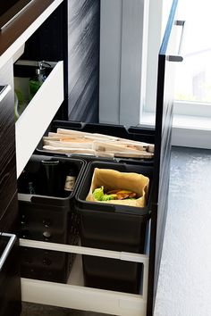 an open drawer with some food in it